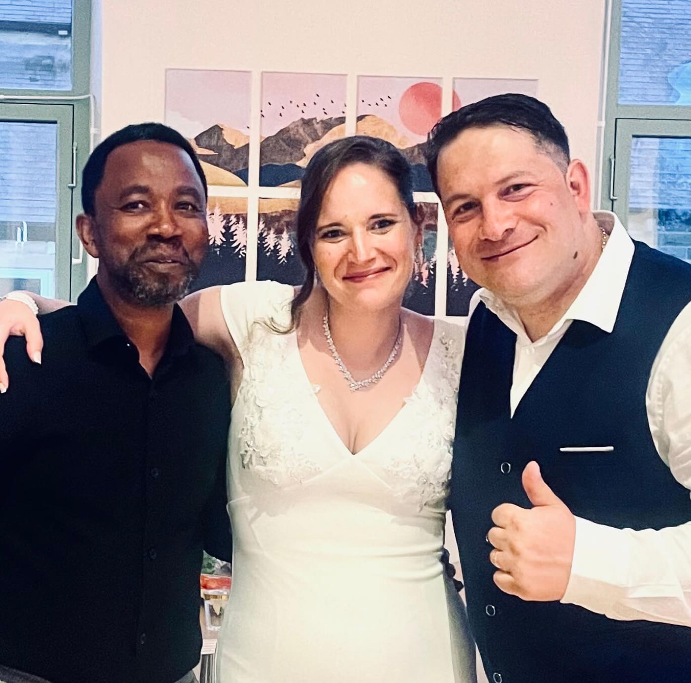 DJ Femzo with wedding couple